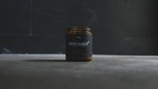 Still shot of Bergamot candle smoke with black background